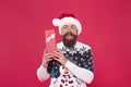 Christmas gift concept. Man celebrate winter holiday. Hipster in winter sweater. Winter season holidays. Box in his Royalty Free Stock Photo