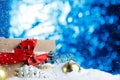 Christmas Gift and Decoration on Snow Close up Royalty Free Stock Photo