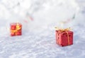 Christmas gift on defocused lights background Royalty Free Stock Photo