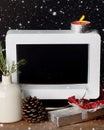 Christmas gift with empty picture frame on wooden table Royalty Free Stock Photo