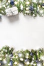 Christmas with gift, fir branches on white . Xmas greeting card with copy space Royalty Free Stock Photo