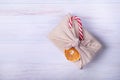 Christmas gift in furoshiki packaging. Zero waste, ecological christmas holiday Royalty Free Stock Photo