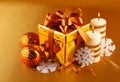 Christmas gift in gold box with bow Royalty Free Stock Photo