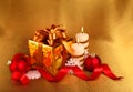 Christmas gift in gold box with bow Royalty Free Stock Photo