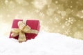 Christmas gift with golden defocused lights Royalty Free Stock Photo