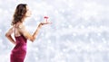 christmas gift present, woman with package on blurred bright lig Royalty Free Stock Photo