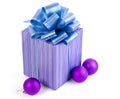 Christmas gift with Purple Ball and ribbon bow Royalty Free Stock Photo