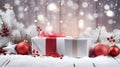 Christmas gift with red ribbons, balls and baubles on snow covered surface. Royalty Free Stock Photo