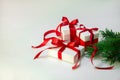 Christmas Gift`s in white box with red ribbon on light background. New year holiday composition. Copy space Royalty Free Stock Photo