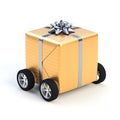 Christmas gift with wheels on white background