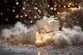 Christmas gIft wrapped in white paper with a satin ribbon  and candles on a soft pad with Christmas lights on the background Royalty Free Stock Photo