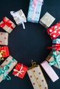 Different christmas gifts on a black background Royalty Free Stock Photo