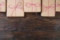 Christmas gifts box presents on wooden background Royalty Free Stock Photo