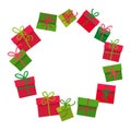 Christmas gifts boxes round frame with empty space for text, Circle of colorful present boxes with red and green bow Royalty Free Stock Photo