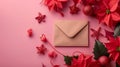Christmas gifts concept: flowers, envelope, and red ornaments on pink background