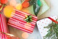 Christmas gifts decorated in colorful paper; christmas background