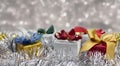 Christmas gifts decorations with silver glister blurred background