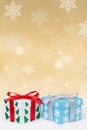 Christmas gifts gold decoration snow snowing portrait format copyspace copy space Royalty Free Stock Photo