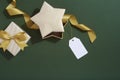 Christmas gifts on green background, wrapping flat lay