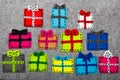 Christmas gifts on grey background. Royalty Free Stock Photo