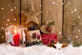Christmas gifts and lantern in the snow