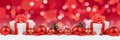 Christmas gifts presents balls banner decoration lights background Royalty Free Stock Photo