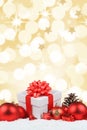 Christmas gifts presents balls decoration golden background port Royalty Free Stock Photo