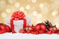 Christmas gifts presents balls golden decoration snow copyspace Royalty Free Stock Photo