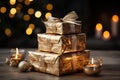 Christmas gifts in shiny paper and bright ribbons and candles on a blurred background with bokeh by the Christmas tree. Merry Royalty Free Stock Photo