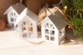 Christmas gifts with snowflakes. Small white houses. Walnuts. Royalty Free Stock Photo