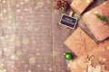 Christmas gifts on wooden background. View from above with copy space