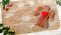 Christmas Gingerbread Angel on rustic wooden background. Royalty Free Stock Photo