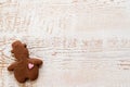 Christmas gingerbread cookies with different shapes over a white vintage wooden table Royalty Free Stock Photo