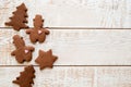 Christmas gingerbread cookies with different shapes over a white vintage wooden table Royalty Free Stock Photo