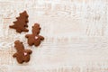 Christmas gingerbread cookies with different shapes over a white vintage wooden table Royalty Free Stock Photo