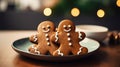 Christmas gingerbread cookies in the form of a man and a woman on a plate Generative AI Royalty Free Stock Photo