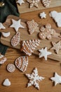 Christmas gingerbread cookies with icing flat lay on festive rustic table. Merry Christmas! Delicious gingerbread cookies, Royalty Free Stock Photo