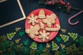Christmas gingerbread cookies of a man, snowflake, bell, star, tree concept of a Christmas Eve with full moon in a forest, Merry Royalty Free Stock Photo