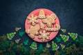 Christmas gingerbread cookies of a man, snowflake, bell, star, tree concept of a Christmas Eve with full moon in a forest, Merry Royalty Free Stock Photo