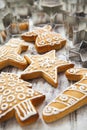 Christmas gingerbread cookies and metal cookie cutters on white Royalty Free Stock Photo