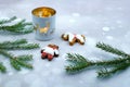 Christmas gingerbread cookies for new year or christmas, candle, fir branches on blur bokeh background Royalty Free Stock Photo