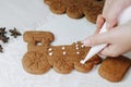Christmas gingerbread cookies painted with icing sugar. Royalty Free Stock Photo
