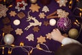 Christmas gingerbread cookies with on purple background. Small B