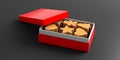 Christmas gingerbread cookies, red gift box, black background Royalty Free Stock Photo