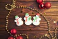 Christmas gingerbread cookies on wooden background Royalty Free Stock Photo