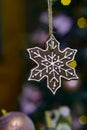 Christmas gingerbread decoration on a tree. Selective focus, bokeh. Holiday background or image . Royalty Free Stock Photo