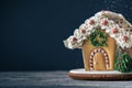 Christmas gingerbread house on the dark background with free space for text Royalty Free Stock Photo