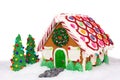 Christmas gingerbread house in snow isolated on white Royalty Free Stock Photo