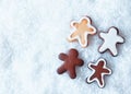 Christmas gingerbread men on snow Royalty Free Stock Photo