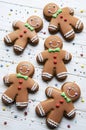 Christmas gingerbread men  on a white wooden background Royalty Free Stock Photo